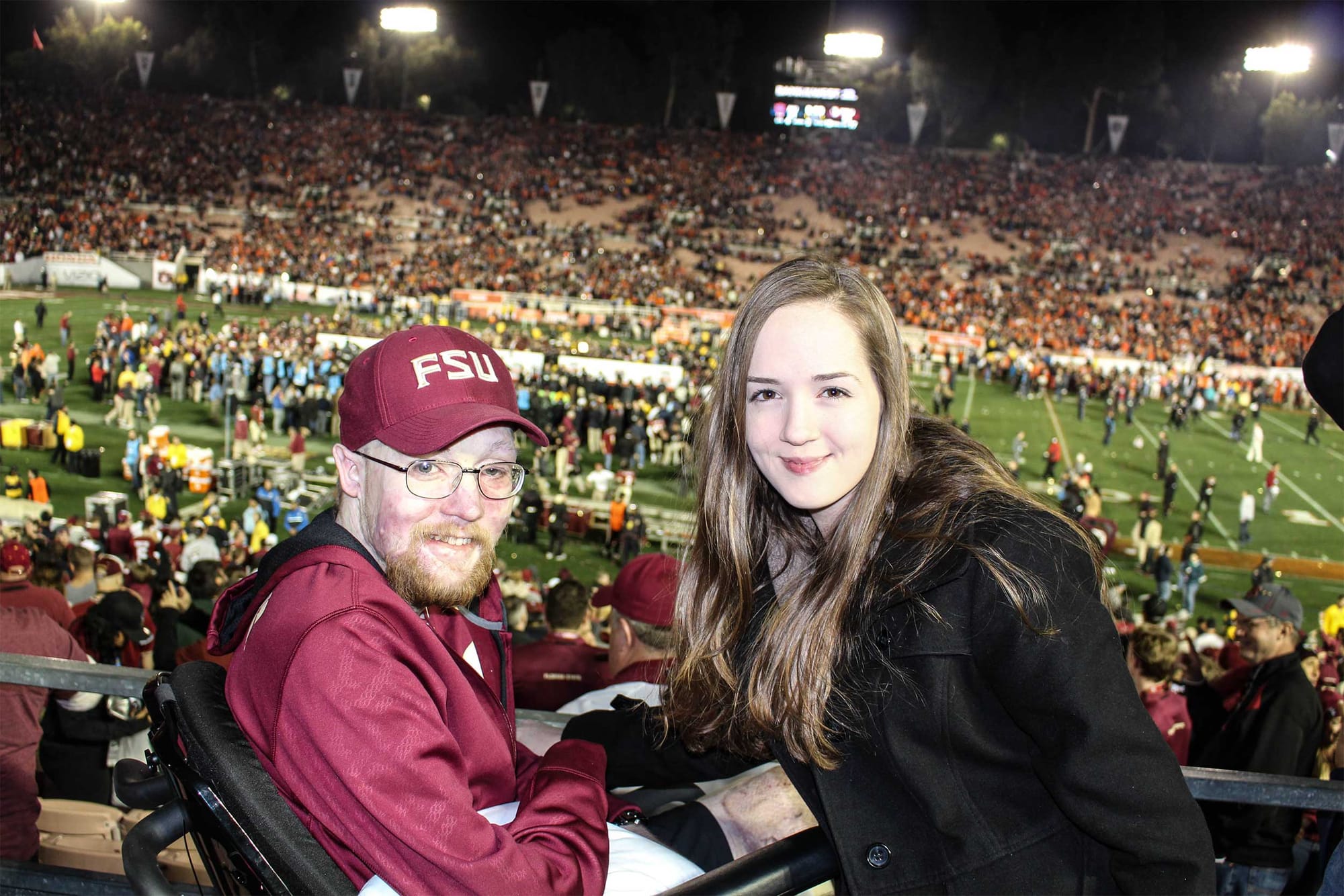 John wearing an FSU hat and jacket inside the Rose Bowl stadium in California.