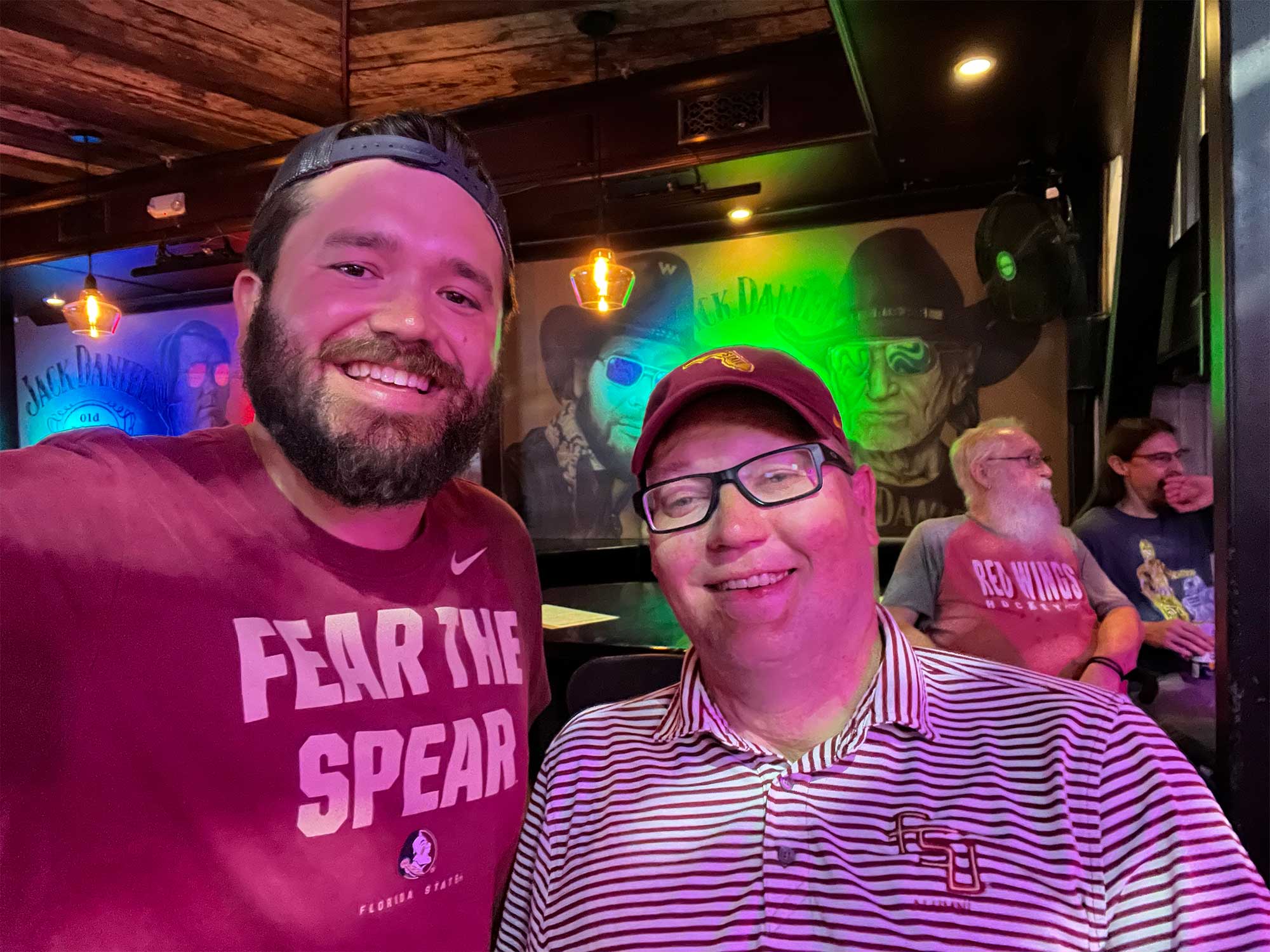 John pictured with friend at Nashville restaurant and bar.