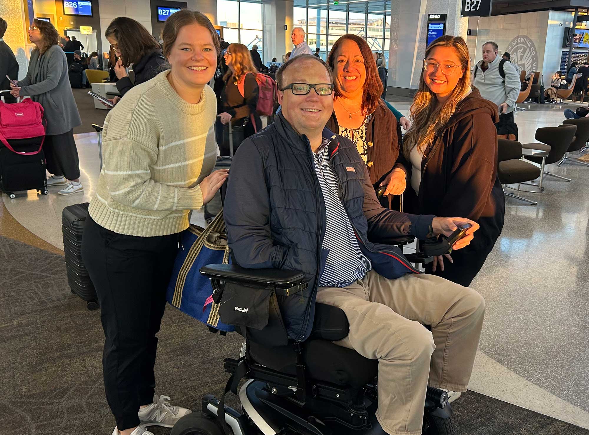 John with the Visit Fort Wayne team in the airport.