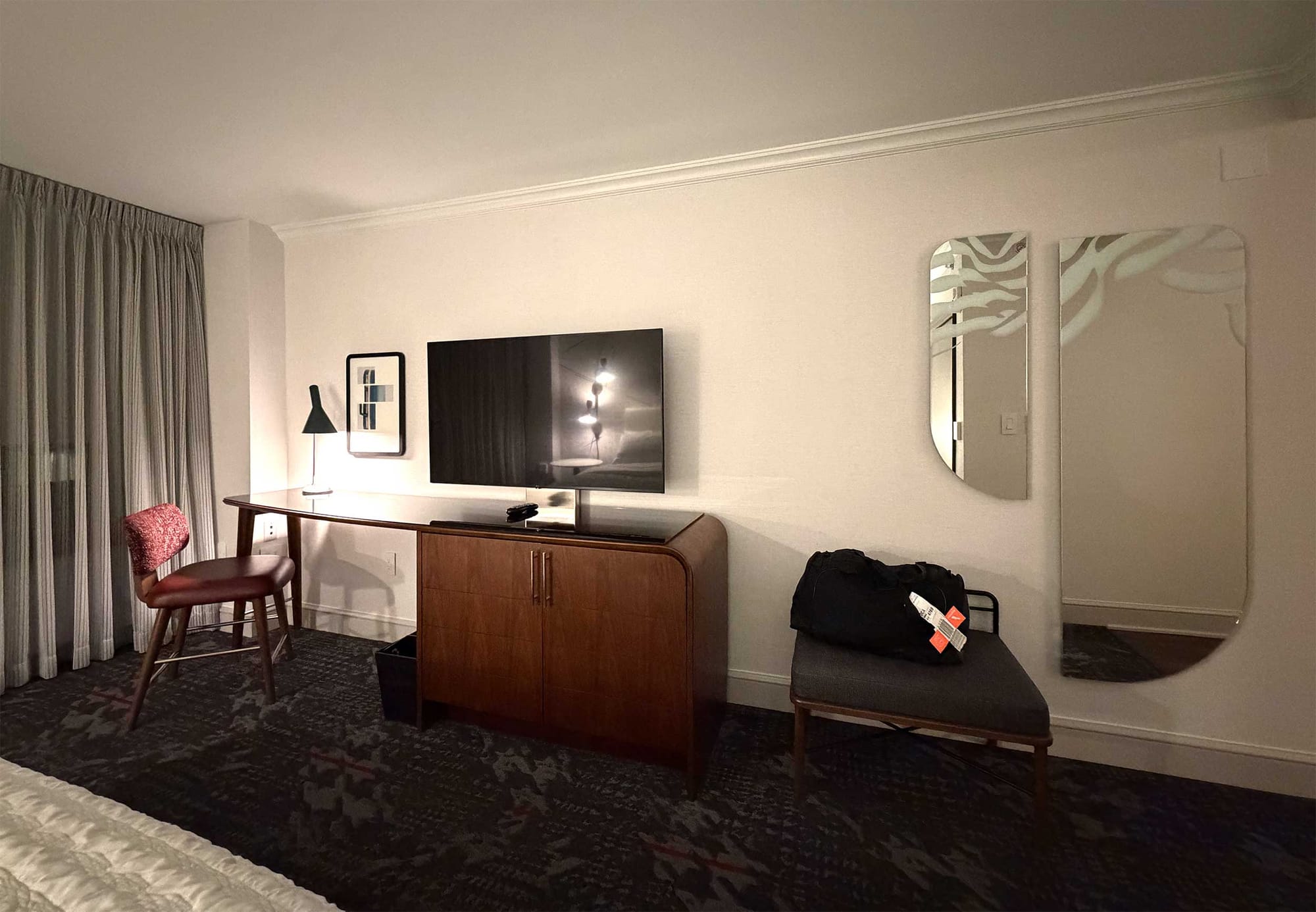 Desk, television and luggage storage.