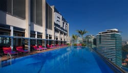 Exterior of the Aloft Kuala Lumpur Sentral Hotel, as seen from the rooftop pool deck.