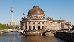 PHOTO DESCRIPTION: Spree River flowing around the Bose Museum and bordering Museum Island in Berlin, Germany.