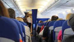 Airplane cabin full of passengers - Air Carrier Access Amendments Act