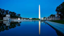 Washington, DC World War II Memorial and Washington Monument at night.