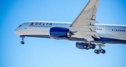 Delta Air Lines Airbus A350 in the air with landing gear retracted.