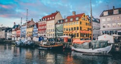 Colorful buildings in front of the water in Copenhagen, Denmark.