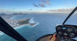 Rio de Janeiro coastline seen through window of helicopter.