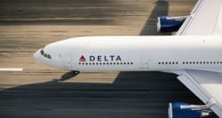 Aerial view of Delta Air Lines Airbus A330 aircraft on runway.