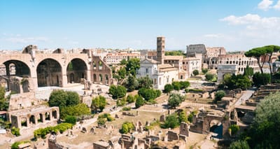 Skyline of the city of Rome's ancient quarter, including the Colosseum and Roman Forum.