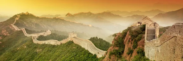 PHOTO: The Great Wall of China set against an orange hued sky.