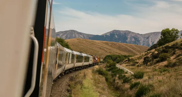 Train passing through valley.