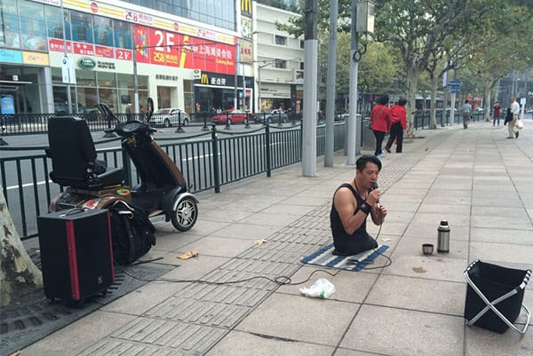 Chen Zhou Legless Street Performer