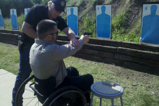 Bear Laird Receiving lesson during concealed handgun license class (shooting Glock 26 9mm)