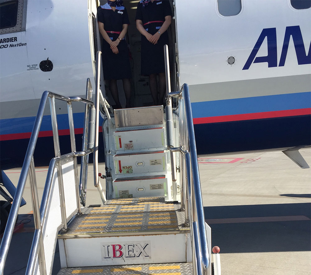 Stairs leading up to the CRJ-700 regional jet