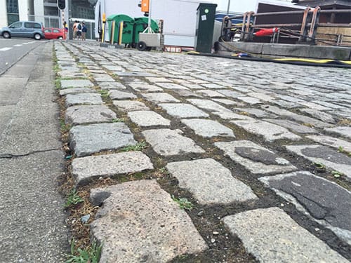 A cobblestone sidewalk in Brussels