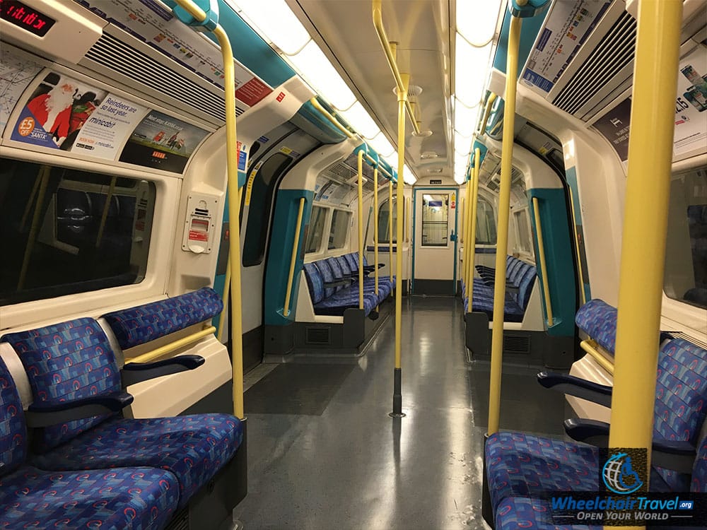 Photo Description: Interior view of a wheelchair accessible subway car on the London Tube metro.