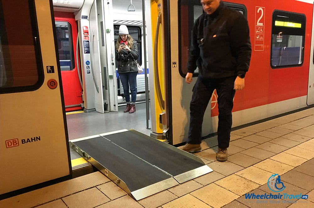 Photo Description: A portable wheelchair access ramp laid out to bridge the gap between an S-Bahn station platform and the train itself.