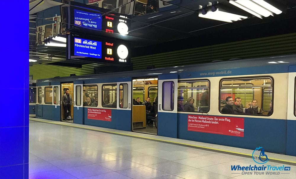 Photo Description: Subway/Metro train stopped at underground U-Bahn station platform.