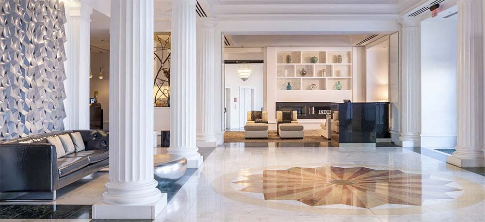 Photo Description: Hotel lobby with sparkling marble floors.