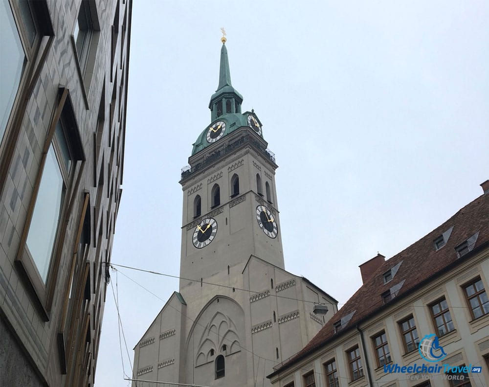 PHOTO DESCRIPTION: Bell tower and steeple of the St. Peter's Church in Munich.