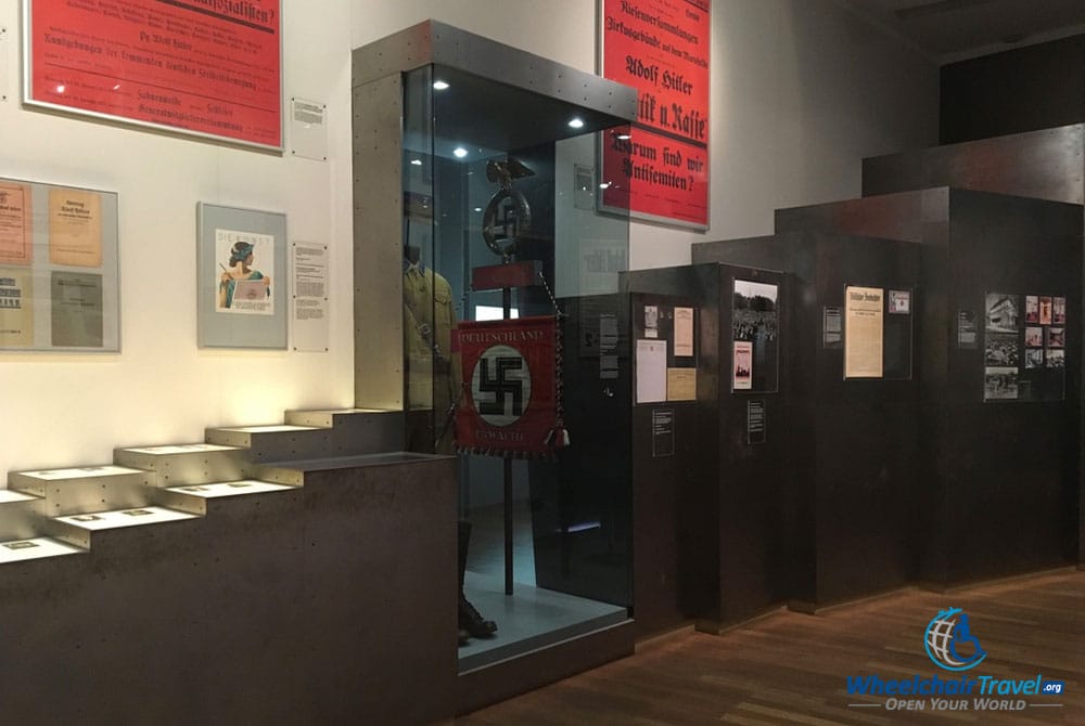 PHOTO DESCRIPTION: A display in the Munich Stadtmuseum that features a Nazi military uniform.