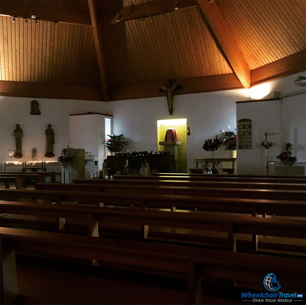 PHOTO DESCRIPTION: Farkened interior of St. Patrick's Catholic Church in London, United Kingdom.