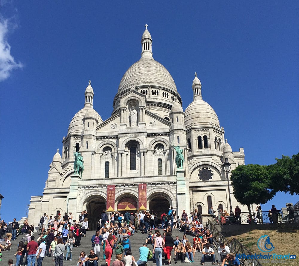 PHOTO DESCRIPTION: Basilica of the Sacred Heart in Paris, at the top of a long staircase.