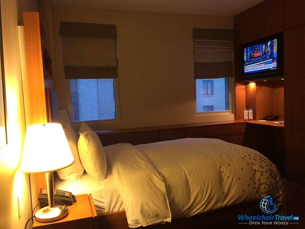 PHOTO DESCRIPTION: Renaissance New York Hotel 57, wheelchair accessible room with king size bed.