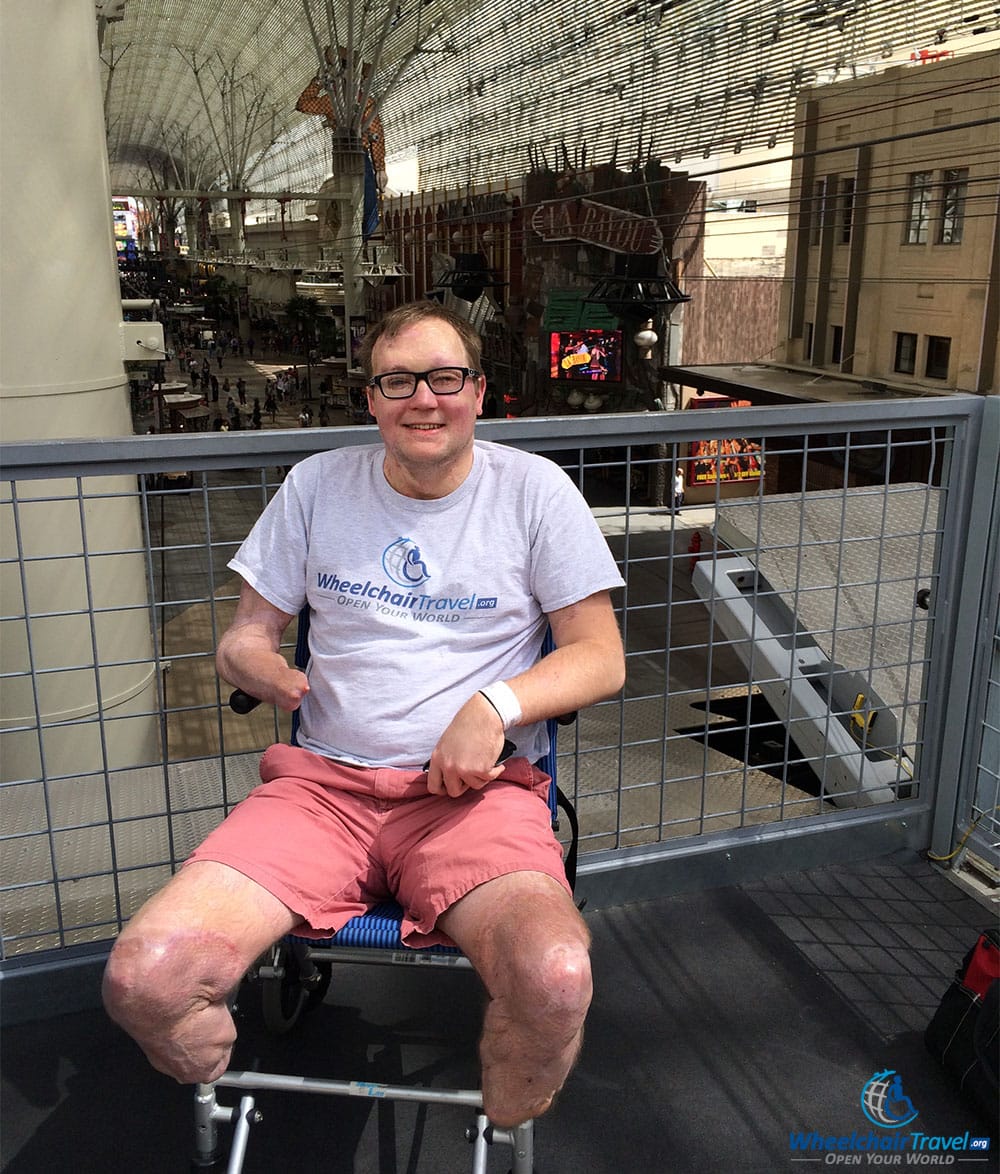 PHOTO DESCRIPTION: John at the end of SlotZilla, looking out over Fremont Street.