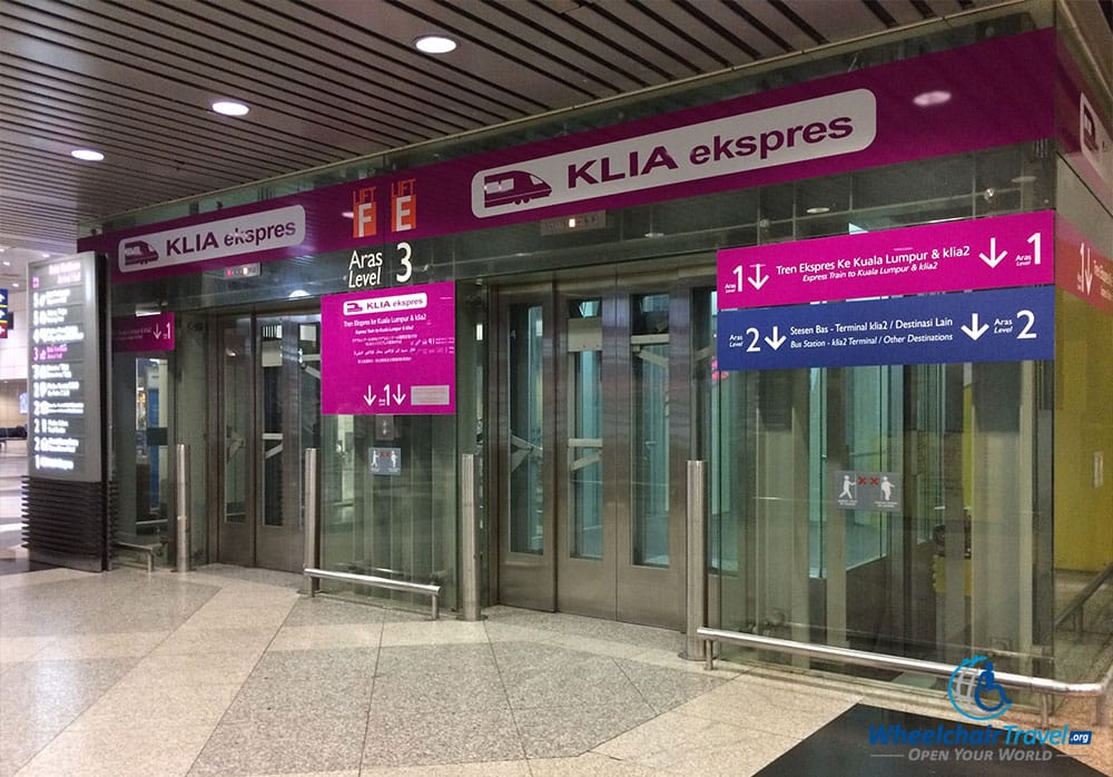 PHOTO DESCRIPTION: Elevators to the KLIA Express train at Kuala Lumpur International Airport.