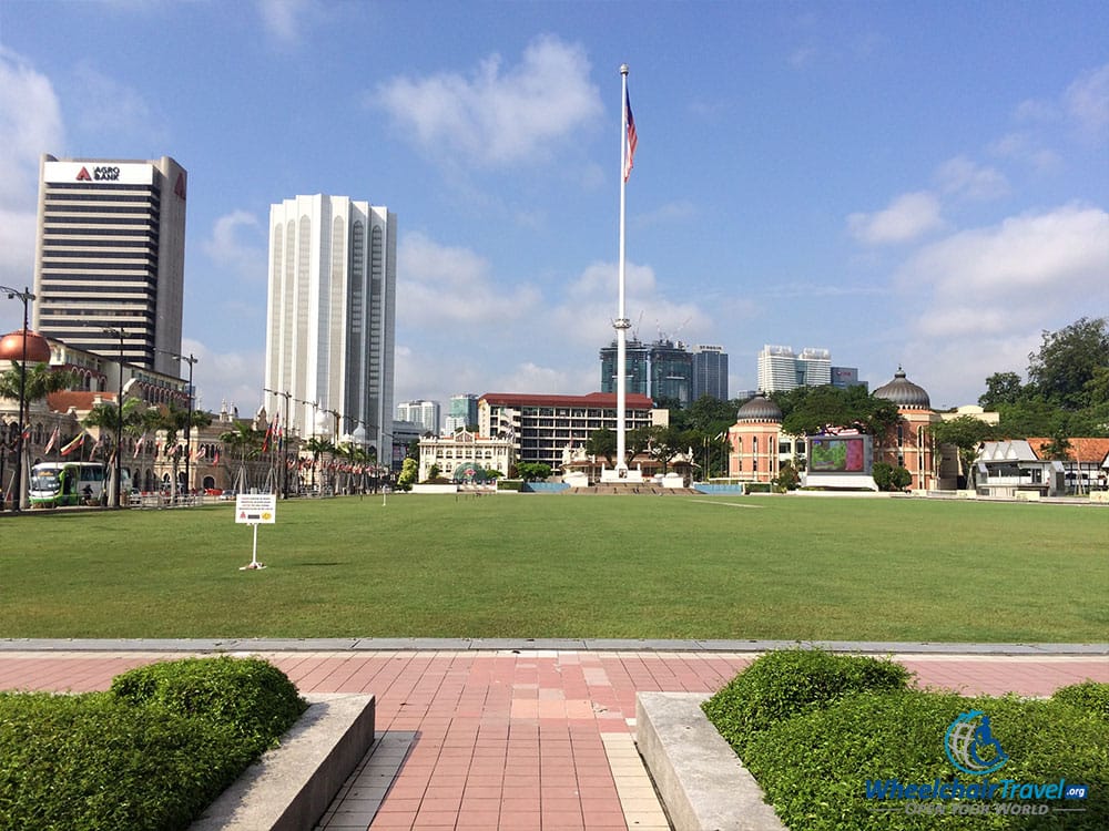 PHOTO DESCRIPTION: Merdeka Square, with the large Malaysian flag flying at the center of the photo.