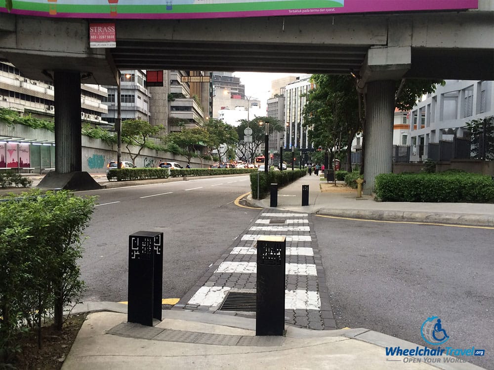 PHOTO DESCRIPTION: Sidewalk curb cut in Kuala Lumpur, Malaysia.