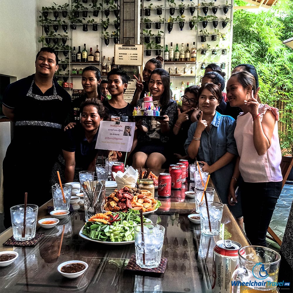 PHOTO DESCRIPTION: A group photo of staff at the House Boutique Hotel in Phnom Penh, Cambodia as they celebrated a team member's birthday.