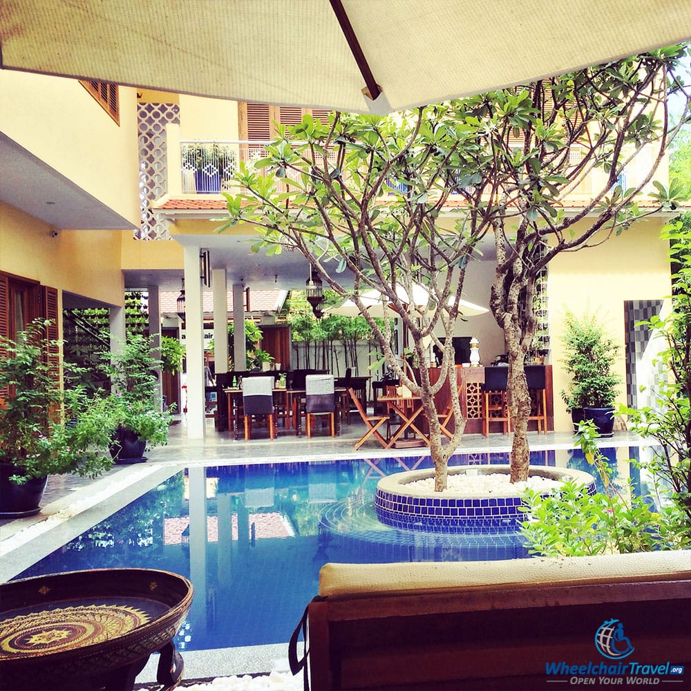 PHOTO DESCRIPTION: Swimming pool and lounge chairs at the House Boutique Hotel in Phnom Penh, Cambodia.