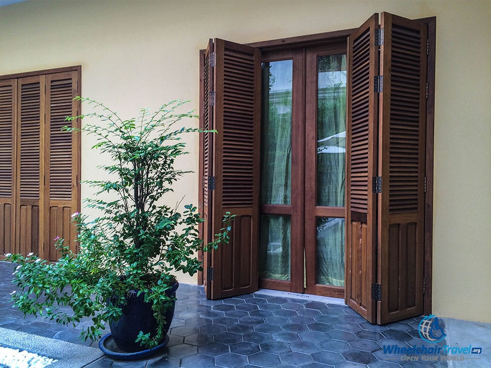 PHOTO DESCRIPTION: Sliding doors to the accessible room at the House Boutique Hotel.