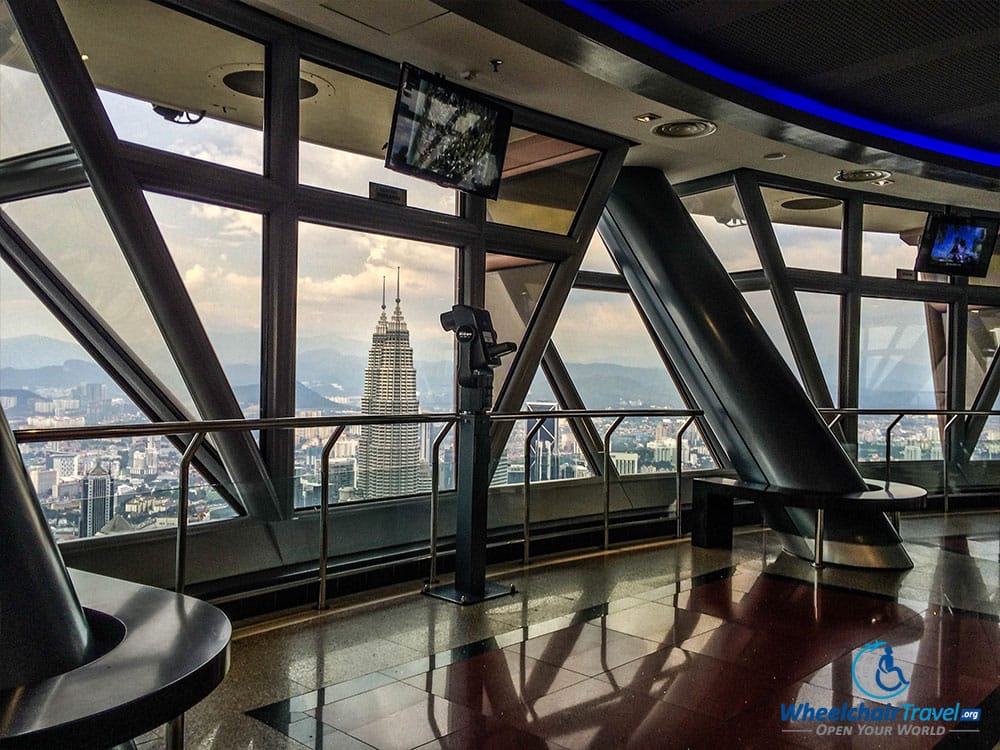 PHOTO DESCRIPTION: View of the Kuala Lumpur city skyline from the KL Tower observation deck.