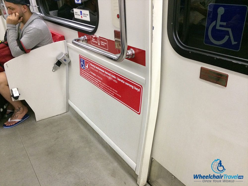 PHOTO DESCRIPTION: Wheelchair space on a new model of LRT train.