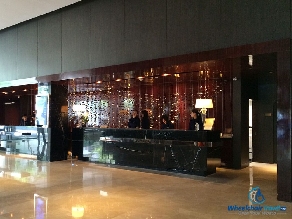 PHOTO DESCRIPTION: Lobby check-in desk at the Radisson Blu Plaza Bangkok Hotel.