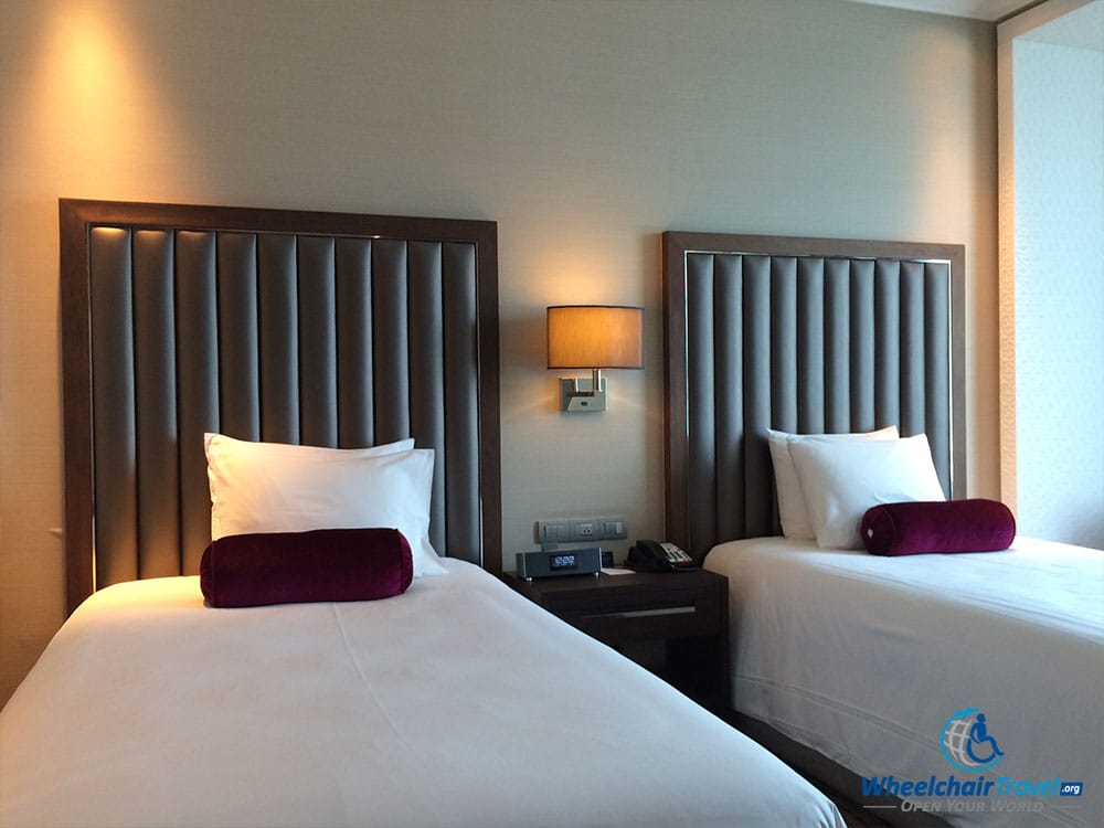 PHOTO DESCRIPTION: Two twin beds at the Radisson Blu Plaza Bangkok Hotel.