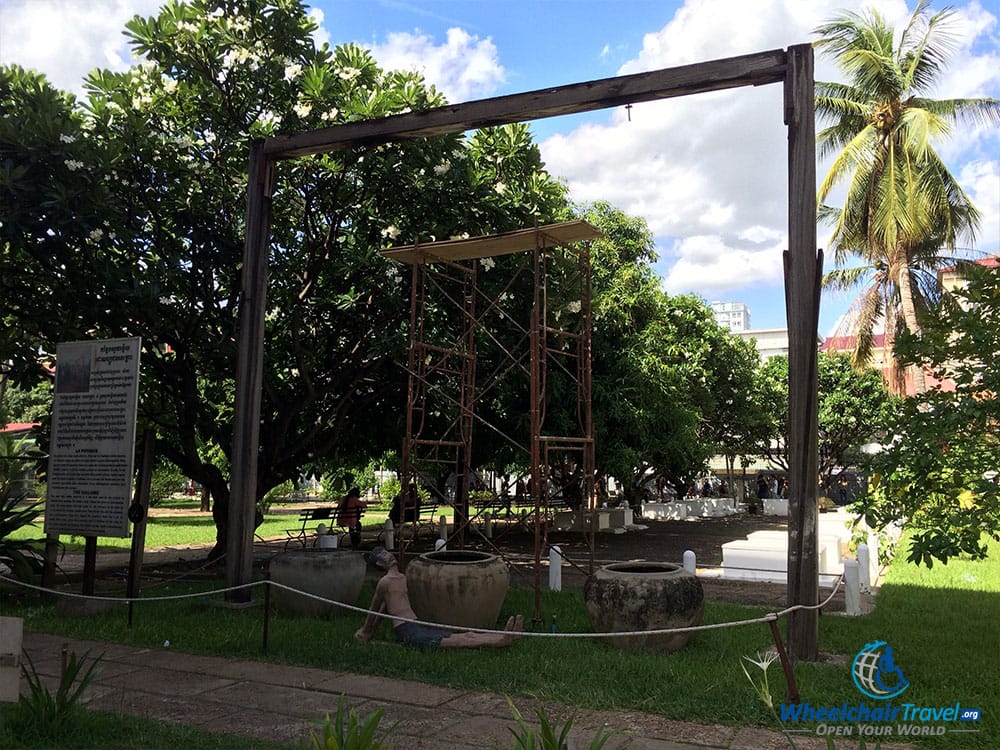 PHOTO DESCRIPTION: Wooden gallows in the courtyard at Tuol Sleng Genocide Museum.