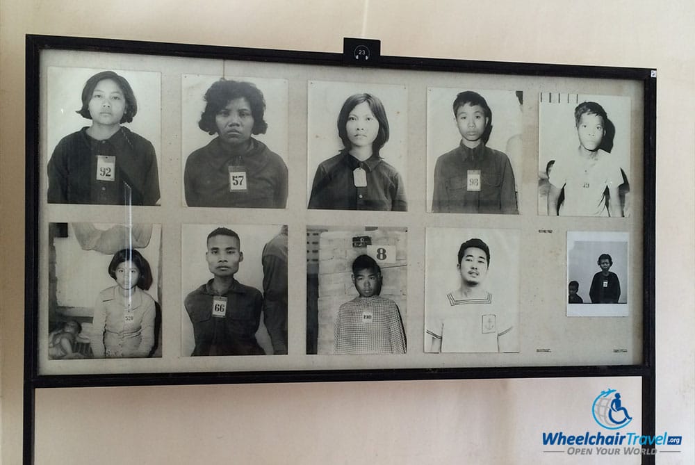 PHOTO DESCRIPTION: A display containing photos of prisoners in S-21 Tuol Sleng.