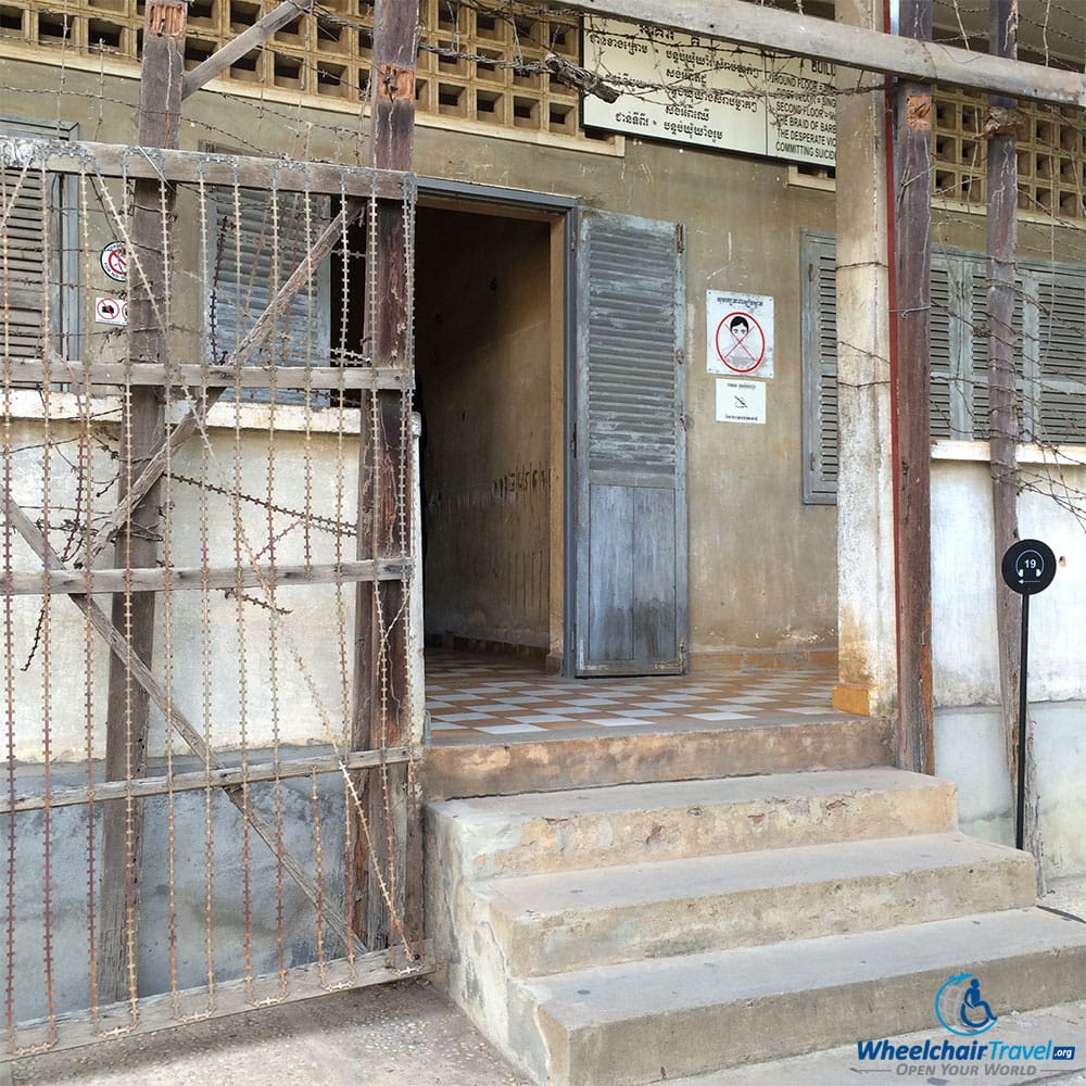 PHOTO DESCRIPTION: Steps leading to a building prevent wheelchair access.