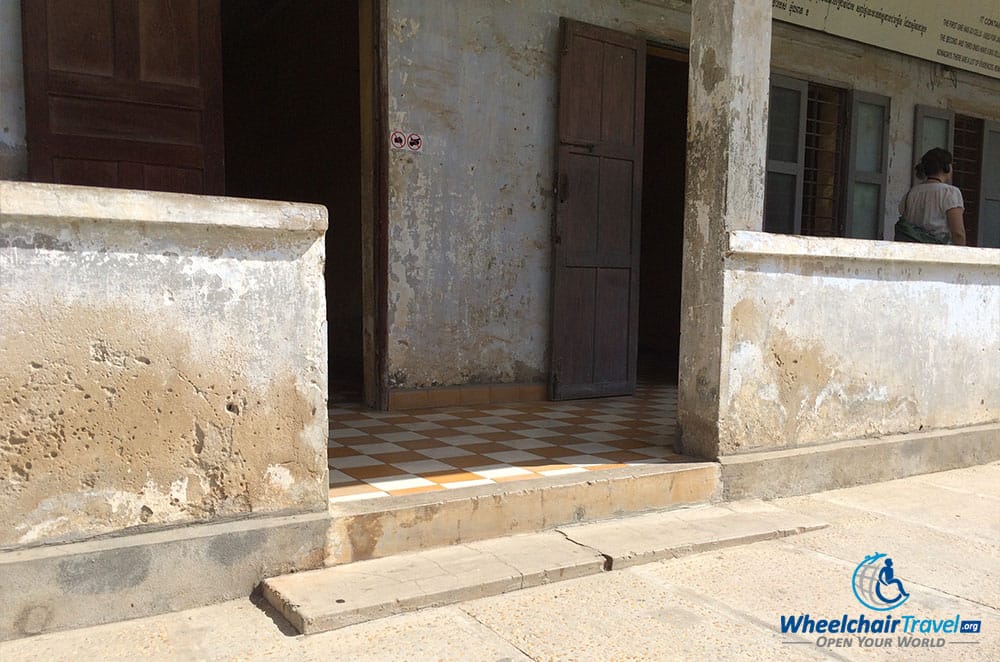 PHOTO DESCRIPTION: Steps leading to a building prevent wheelchair access.