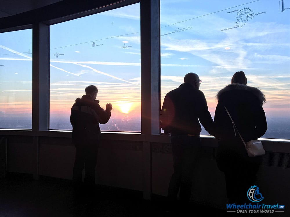 PHOTO DESCRIPTION: Sunset as seen through the windows of the Munich Olympic Tower's observation deck.