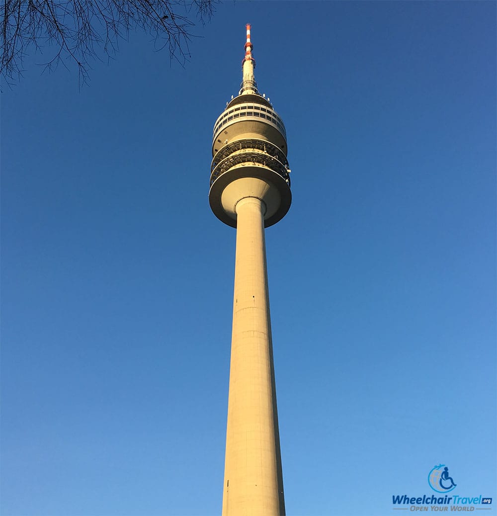 PHOTO DESCRIPTION: Munich Olympic Tower set against a cloudless blue sky.