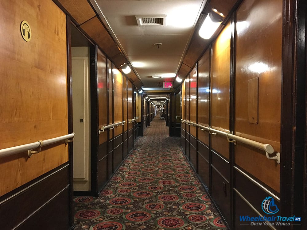 PHOTO: A-Deck passageway onboard the RMS Queen Mary, with passenger cabins located down the hall.