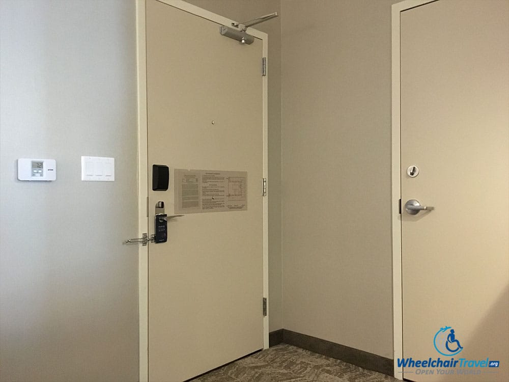 PHOTO: Wheelchair accessible room door.