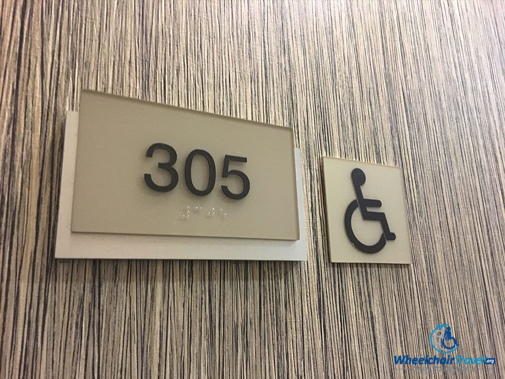 PHOTO: Braille printing on the room number placard.