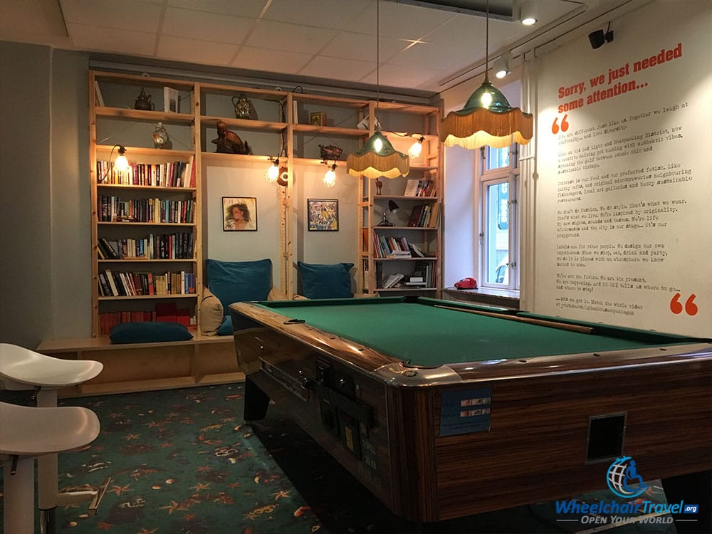 PHOTO: Common room with pool/billiards table at Urban House Hostel in Copenhagen, Denmark.