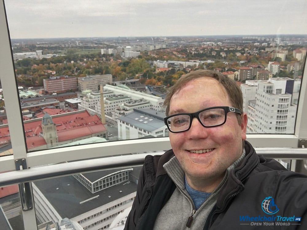 PHOTO: John takes a wheelchair travel selfie inside SkyView Stockholm.